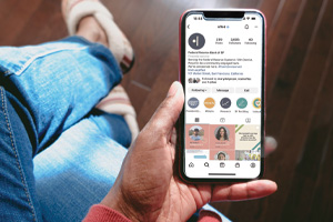 Mobile devices displaying SF Fed social media page