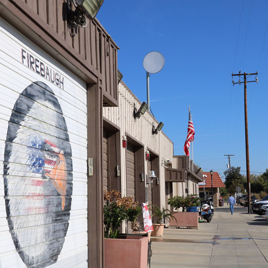 Patriotic eagles and flags decorate the Firebaugh Fire Department building