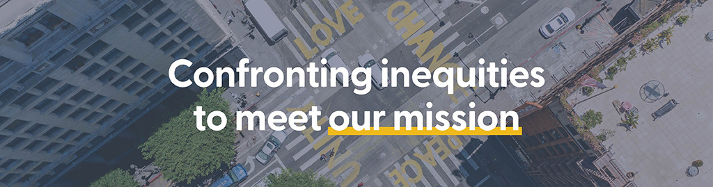 Cityscape background image with text overlay that reads: Confronting inequities to meet our mission