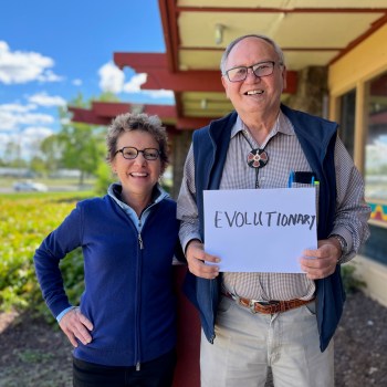 President Mary C. Daly alongside Chairman Delano Saluskin holding his one word description of Yakama Nation. The one word description is Evolutionary.