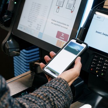 Mobile phone in a person's hand.