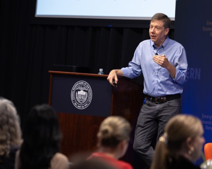 Man standing in front of a podium.