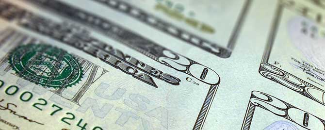 Sheet of freshly-printed $20 bills.