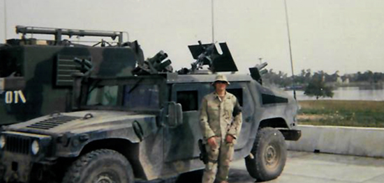 Don on a patrol break outside of Al-Shaheed Monument, known as the Martyr’s Memorial, in Baghdad, Iraq (2004).