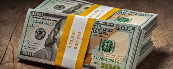 Stacks of $100 Federal Reserve Notes