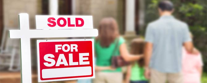 Sold Sign on Family Home