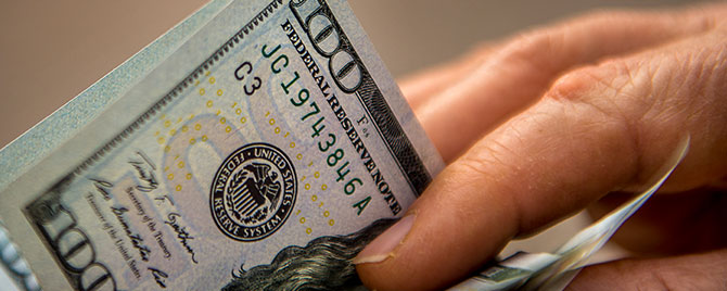 Hand Holding Cash