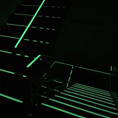 A dark stairwell lit by photoluminescent technology.