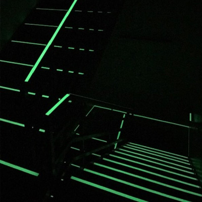 A dark stairwell lit by photoluminescent technology.