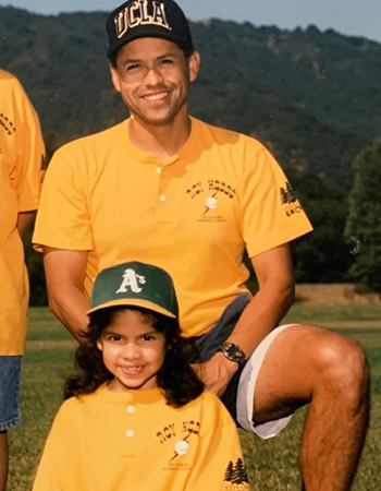 Kylie with her father, who served as her Little League coach.
