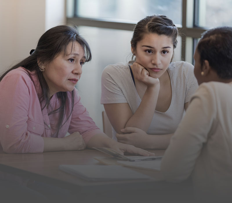 Women meeting with bank employee