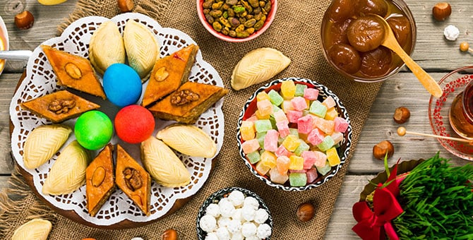 Colored eggs, wheat springs, and sweet pastries