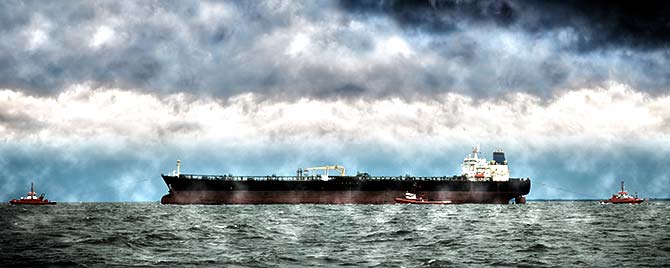 photo of ship in stormy seas