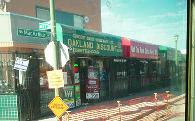 Small businesses closed except for discount grocery store on Macarthur